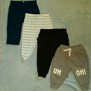 (4) pairs 0/3m pants
